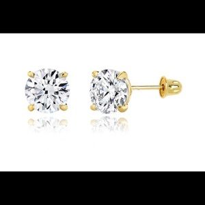 See Photos. Brand New. Pair diamond  studs .50 cts